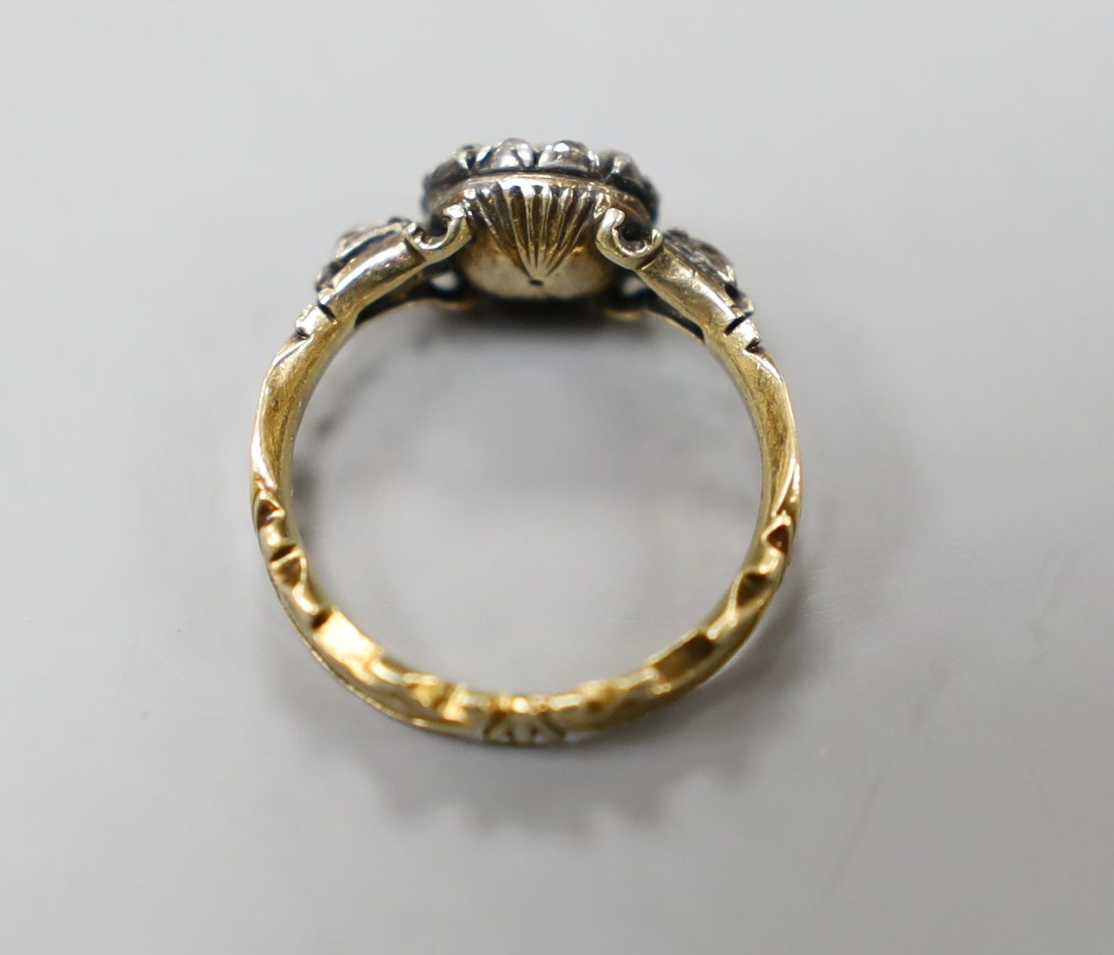 A late 18th century gold and old cut diamond set circular cluster ring